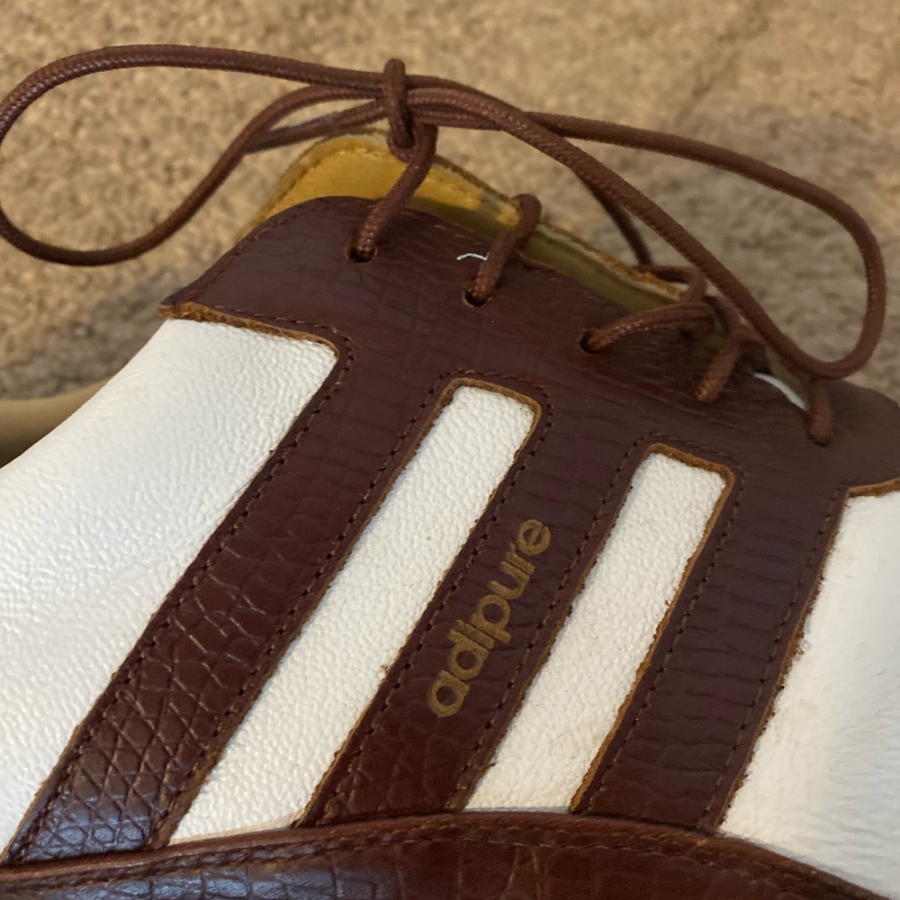 AdiPure golf shoe.      Free second pair